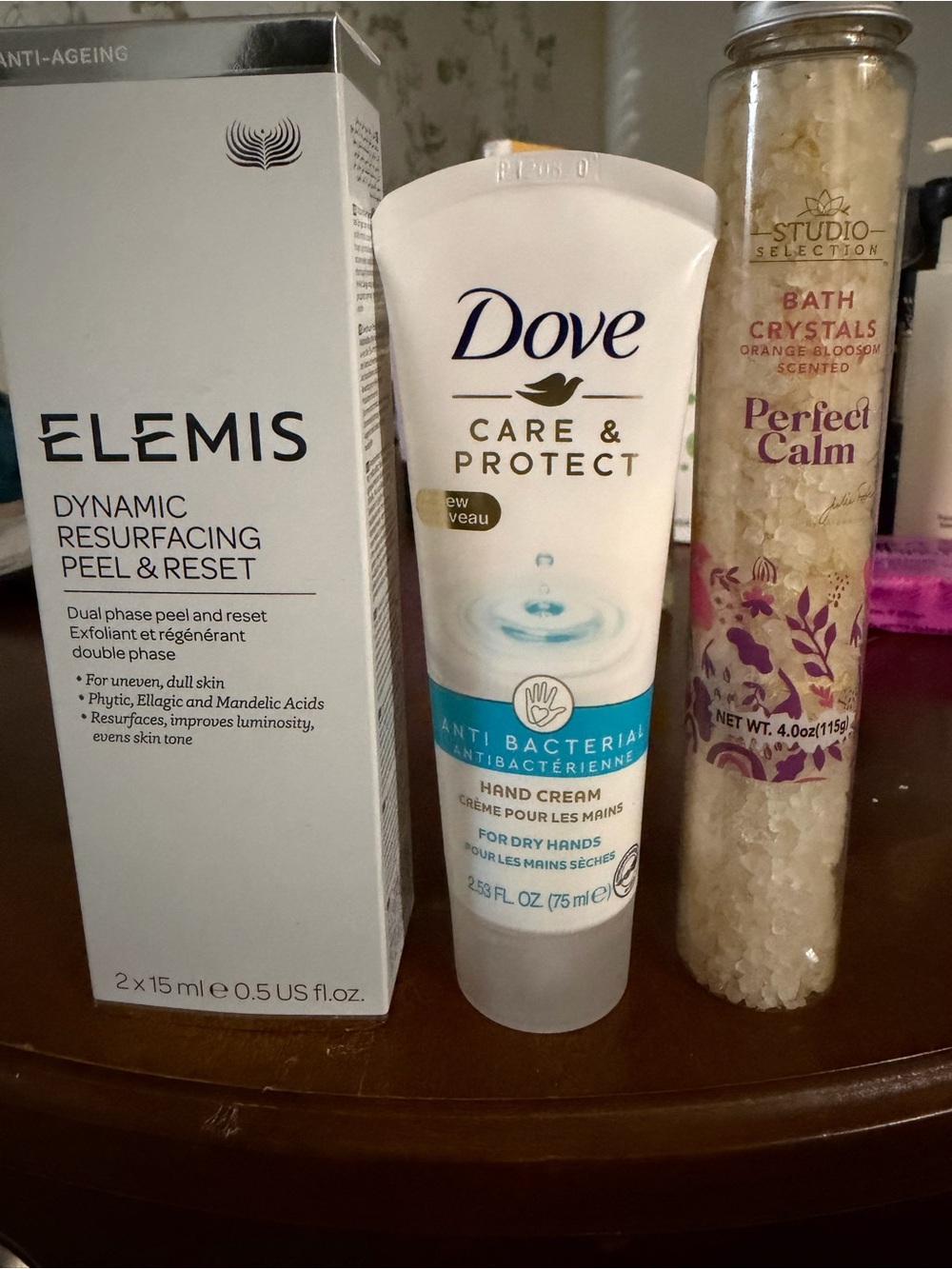 Bundle ELEMIS Peel & Reset,Dove Care and Protect, and Bath Salts.
